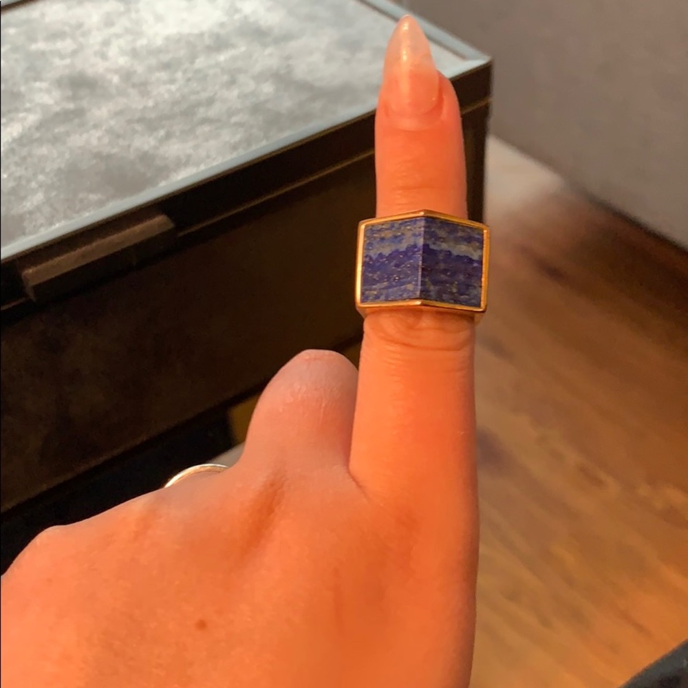 Gold ring with blue stone